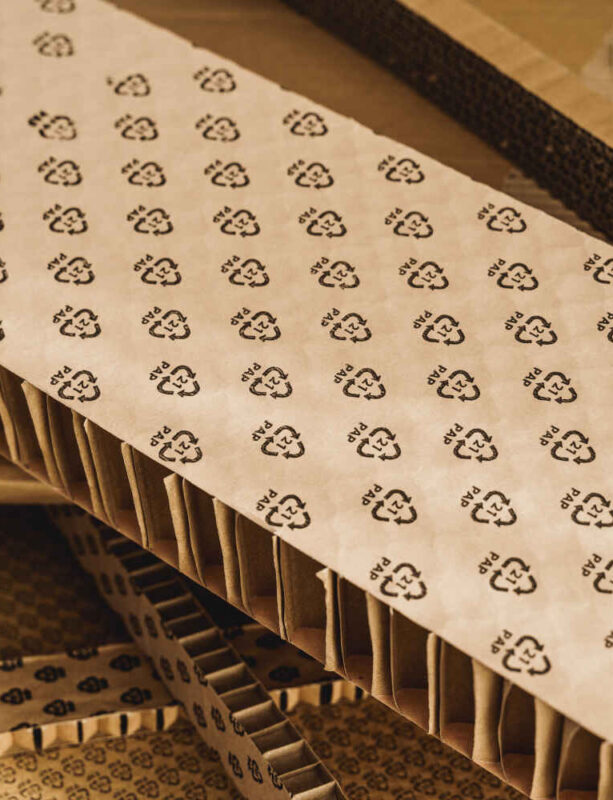 Closeup shot of Cardboard Waste with PAP 21 symbol. Concepts of Paper Recycling and Waste Sorting.